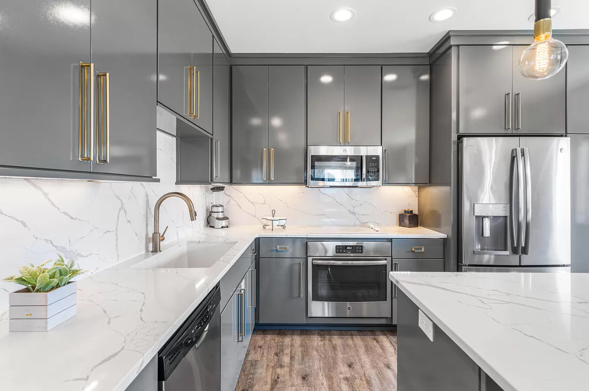 Contemporary kitchen with marble countertops